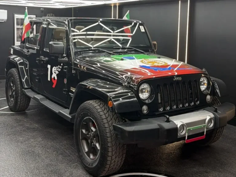 Black Jeep with custom graphics at 404 Auto Repair